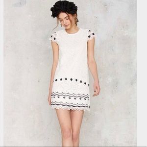 White and Navy blue lace dress.